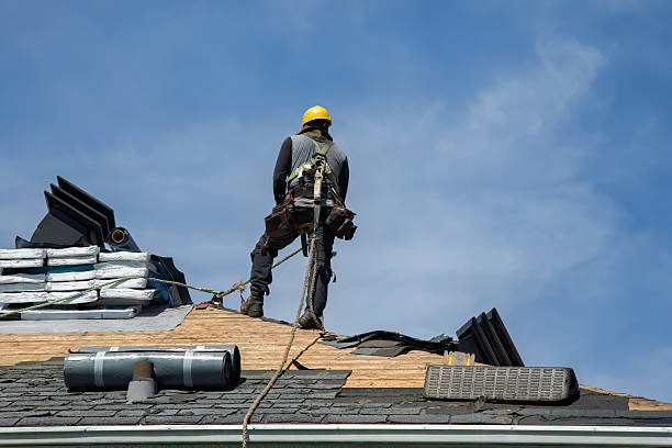 Professional Roofing technician working in Brighton, CO